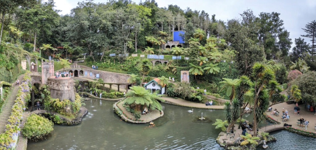 Some of the greenery, sculptures and zigzagging paths around the main lake at Monte Palace Gardens